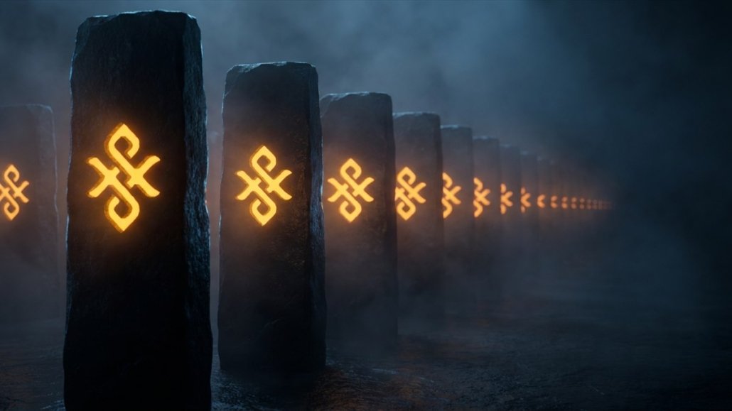Lunga fila di lastre di pietra identiche illuminate di ambra, allineate nel buio come le pagine di un registro infinito, ognuna incisa con lo stesso segno della precedente